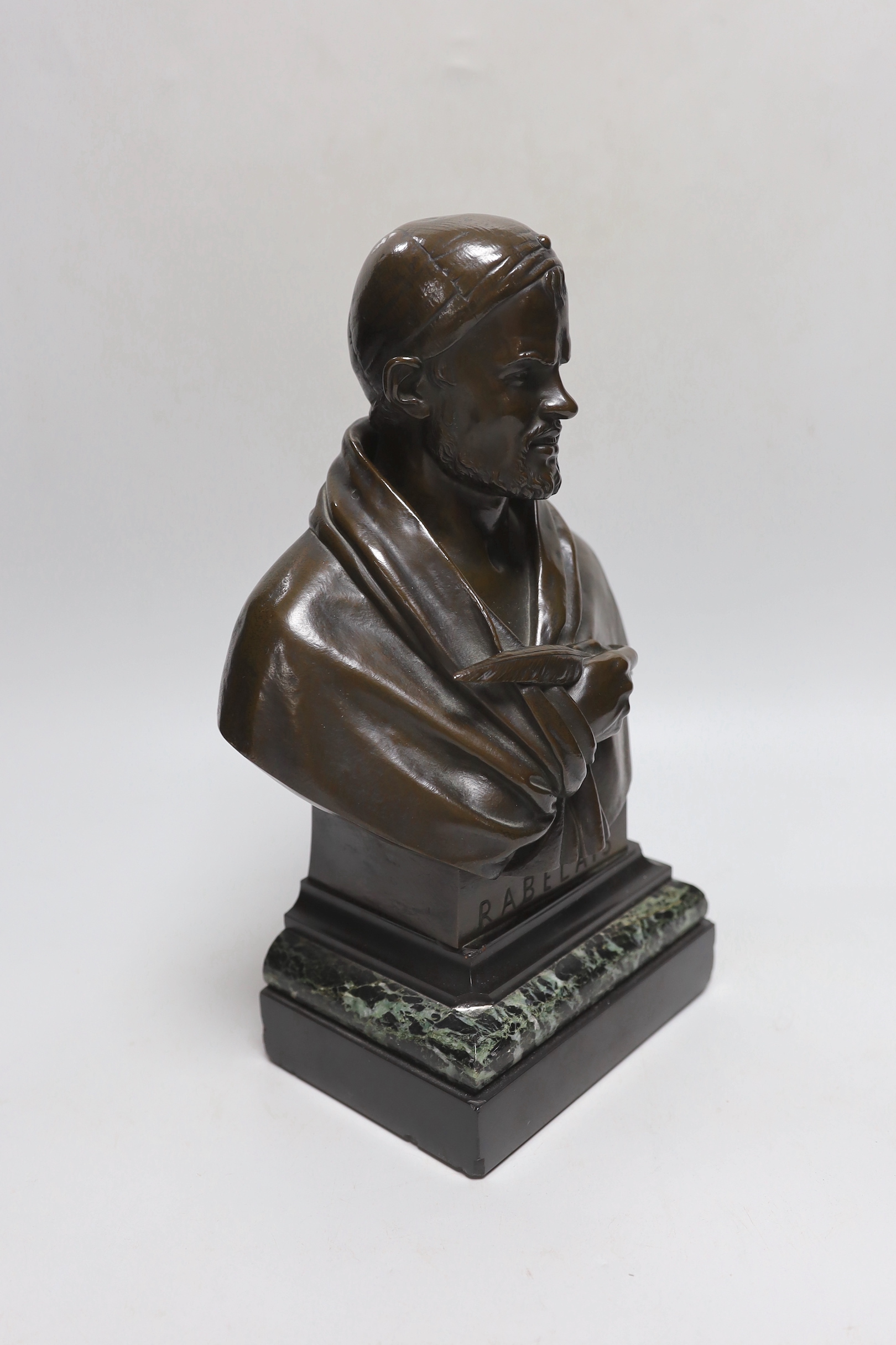 Attributed to Louis Robert: A bronze bust of Rabelais on marble stand, 30cm high